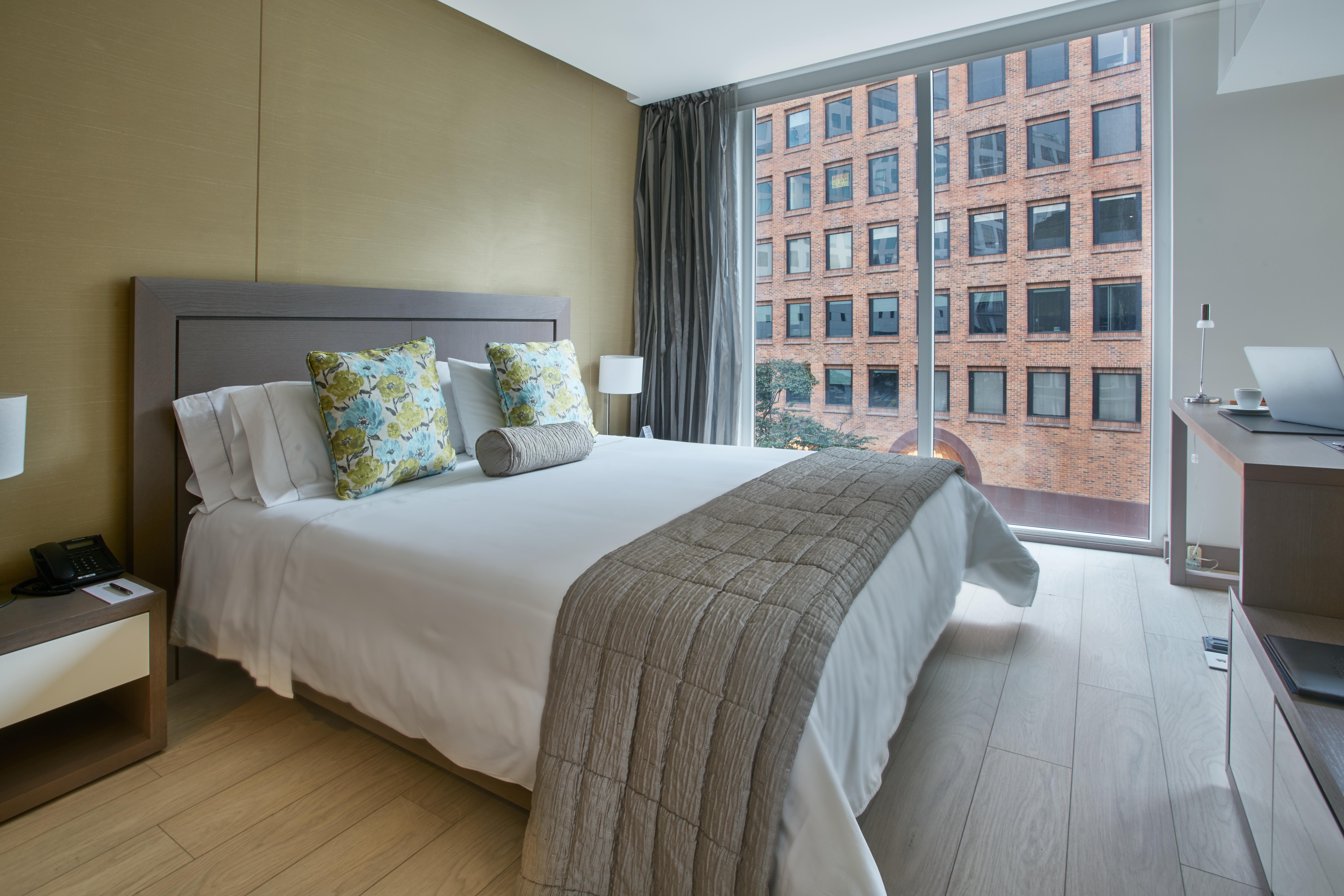בוגוטה Hotel 100 Luxury Suites By Preferred מראה חיצוני תמונה A bedroom at the hotel