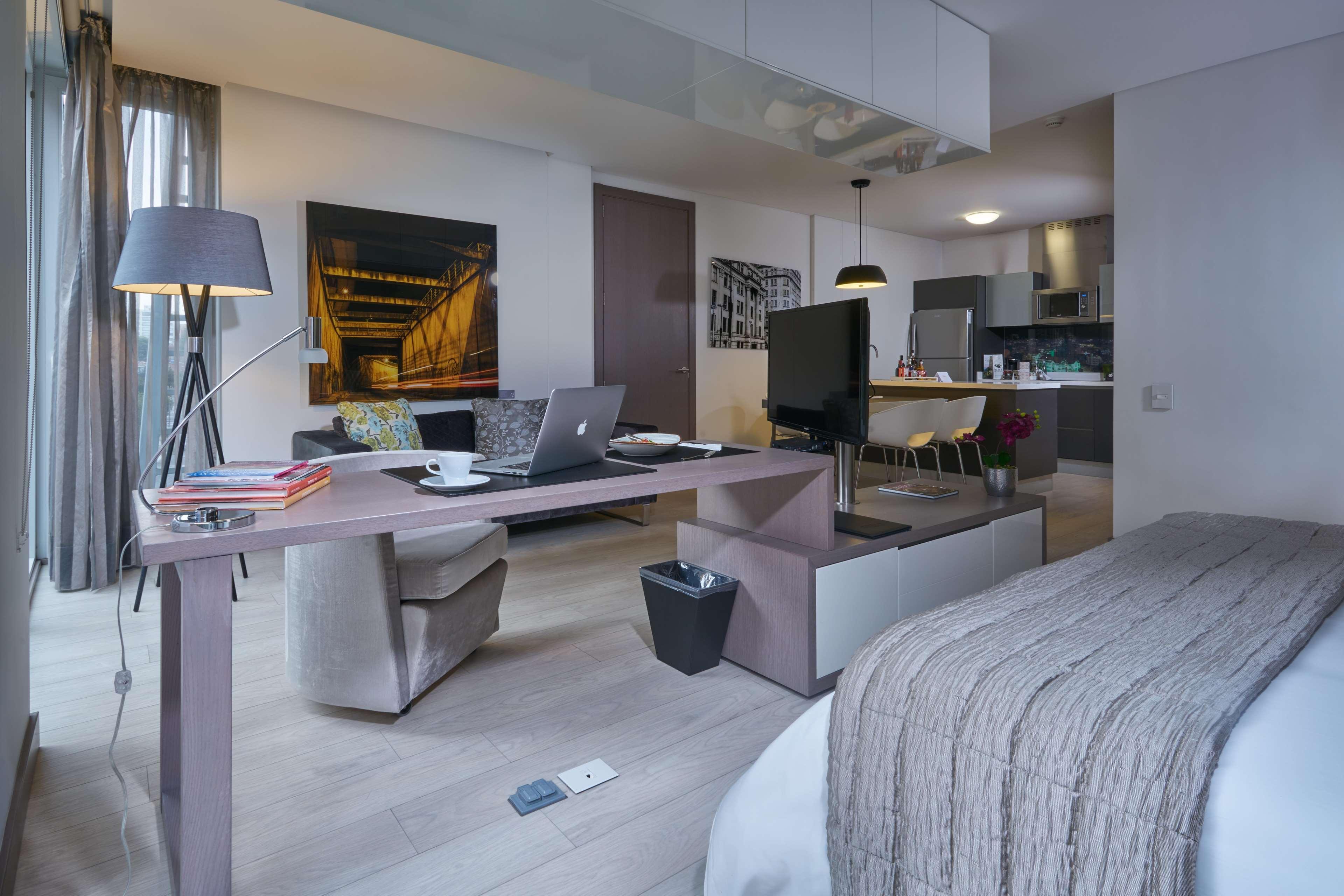 בוגוטה Hotel 100 Luxury Suites By Preferred מראה חיצוני תמונה A typical studio apartment