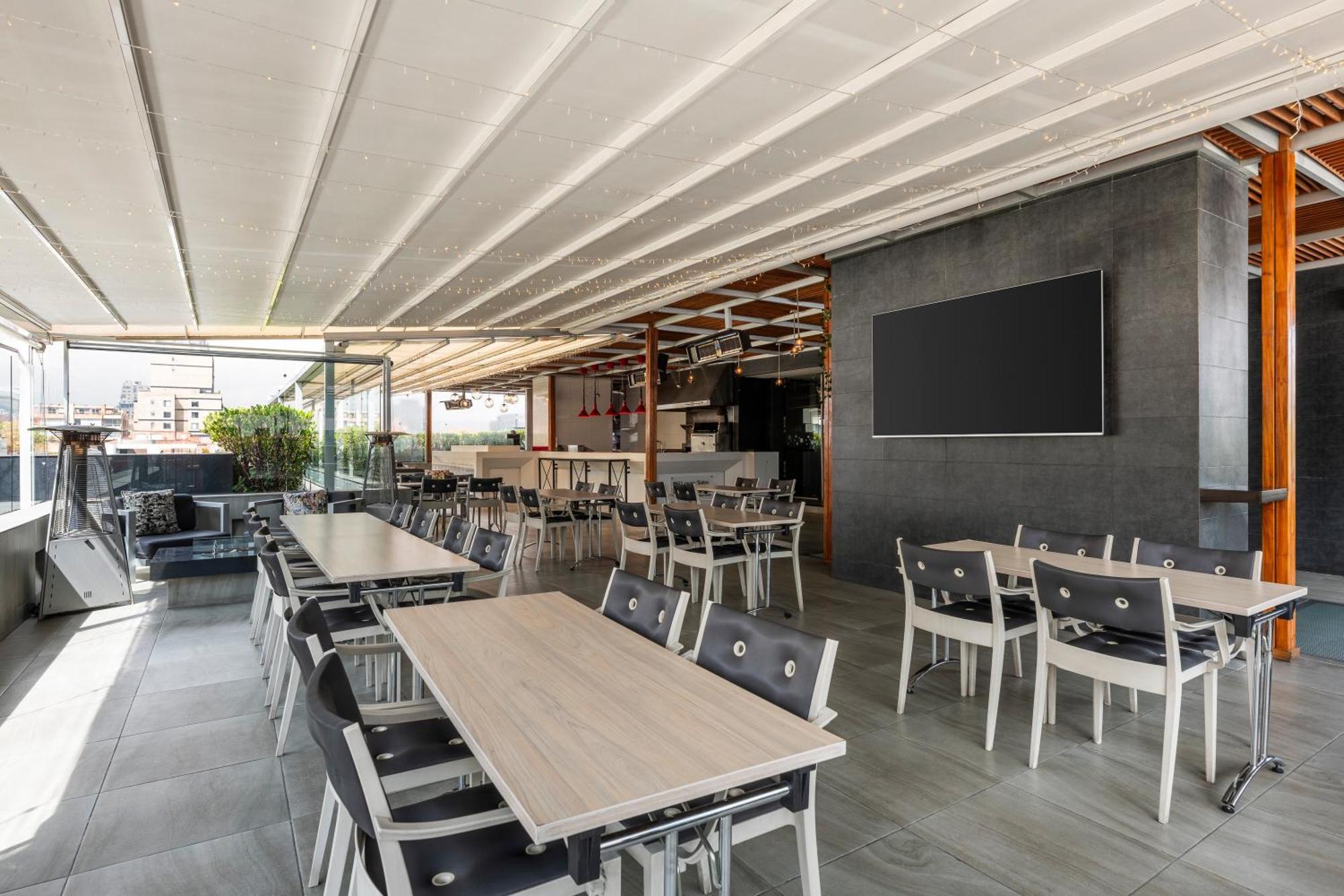 בוגוטה Hotel 100 Luxury Suites By Preferred מראה חיצוני תמונה The restaurant