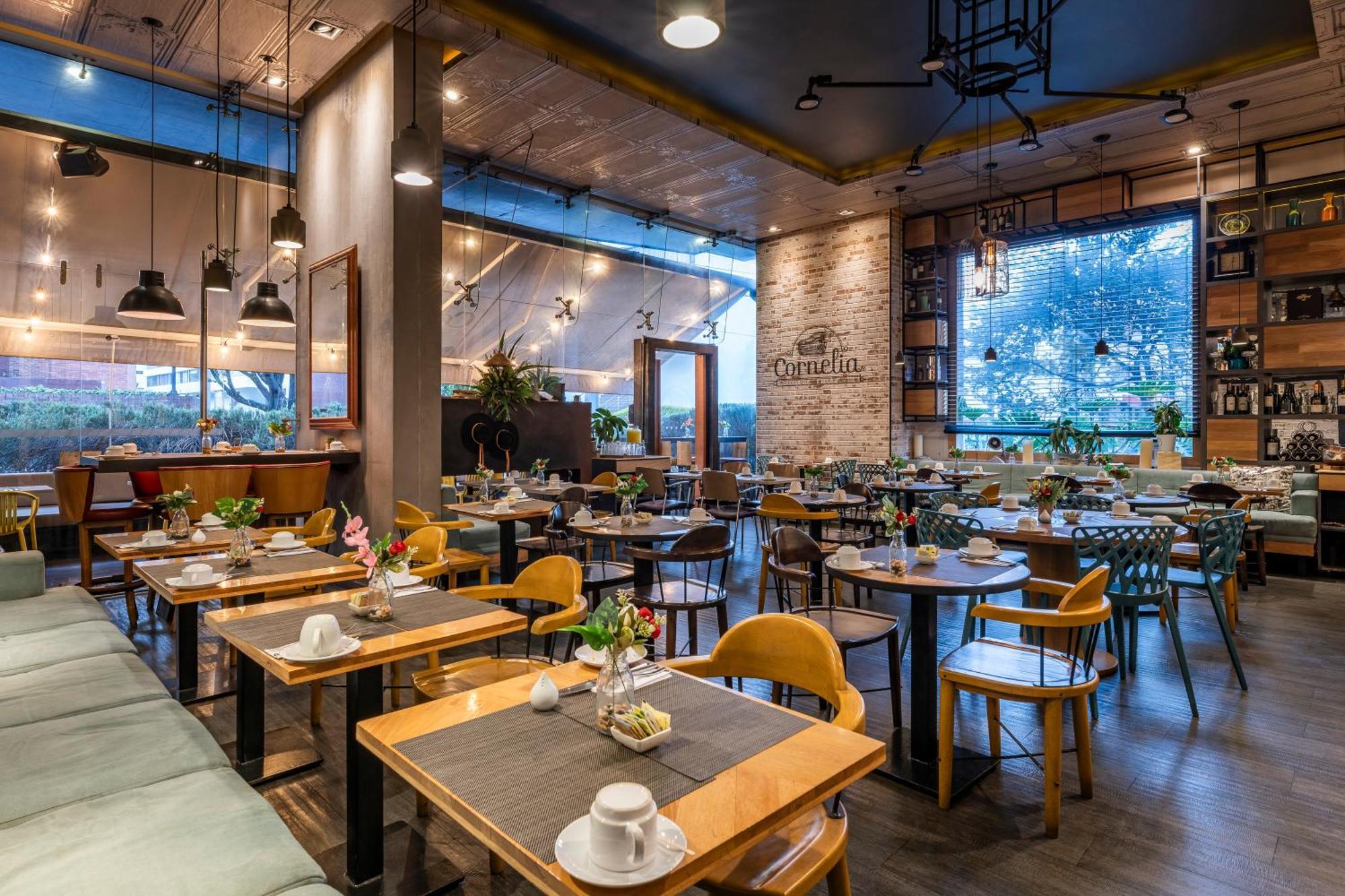 בוגוטה Hotel 100 Luxury Suites By Preferred מראה חיצוני תמונה Restaurant in the hotel