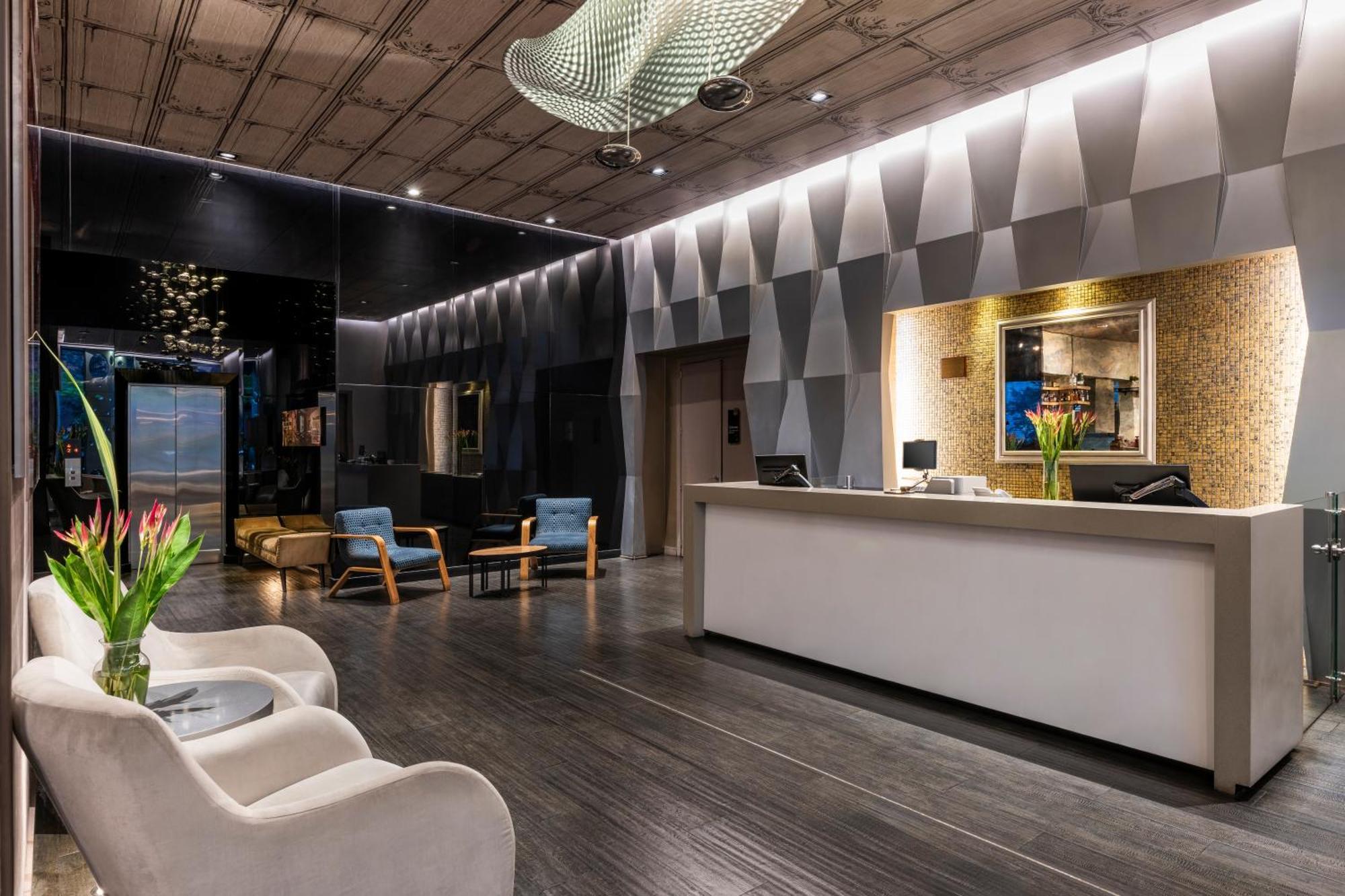 בוגוטה Hotel 100 Luxury Suites By Preferred מראה חיצוני תמונה The lobby of the hotel
